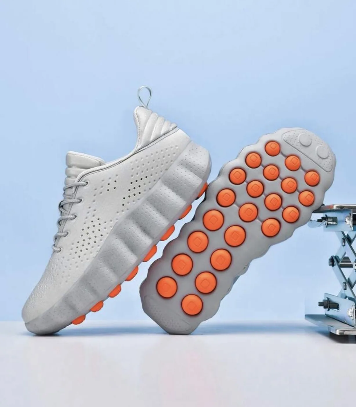 Chaussures de sport à technologie de massage par détection de mouvement du pied
